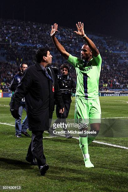 Didier Drogba of Chelsea applauds the fans following his team's 1-0 defeat during the UEFA Champions League Group F match between Marseille and...