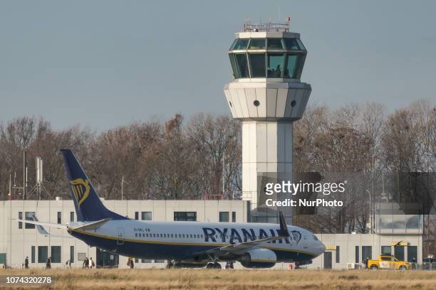 Ryanair low cost carrier Boeing 737-800 or 737-8AS with registration EI-EKL seen in Maastricht Aachen Airport MST / EHBK with the terminal building...