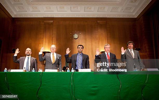 James Angel, associate professor at the McDonough School of Business at Georgetown University, from left, Thomas Peterffy, chief executive officer of...