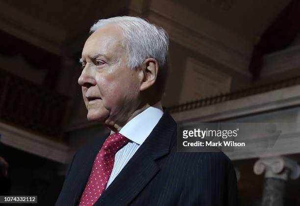 Sen. Orrin Hatch walks away after swearing in Sen. Cindy Hyde-Smith during a ceremonial swearing in, inside the old Senate Chamber on December 17,...