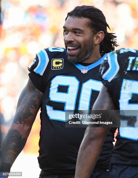 Defensive end Julius Peppers of the Carolina Panthers walks along the sideline in the third quarter of a game against the Cleveland Browns on...