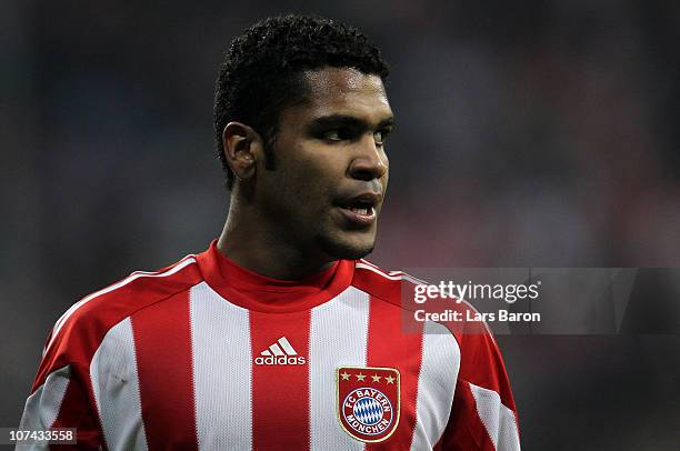 Breno of Muenchen looks on during the UEFA Champions League group E match between FC Bayern Muenchen and FC Basel at Allianz Arena on December 8,...