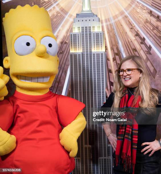 Bart Simpson and Nancy Cartwright visit The Empire State Building to celebrate the 30th anniversary of "The Simpsons" at The Empire State Building on...