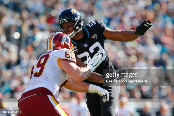 Jacksonville Jaguars Defensive End Calais Campbell is blocked by Washington Redskins Offensive Guard Luke Bowanko during the game between the...