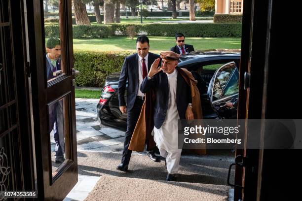 Bloomberg Best of the Year 2018: Ashraf Ghani, Afghanistan's president, center, arrives at the Presidential Palace in Kabul, Afghanistan, on...