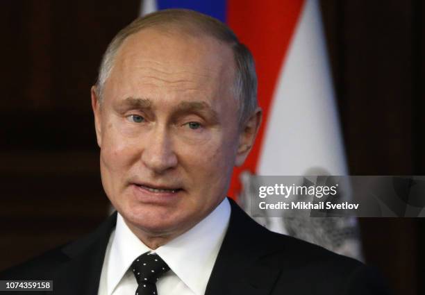 Russian President Vladimir Putin speaks during the Extended Board of Defence Ministry, an annual meeting with top high ranked officers on December...