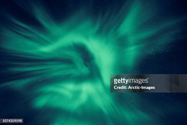 aurora borealis and corona, iceland - weltall hell stock-fotos und bilder