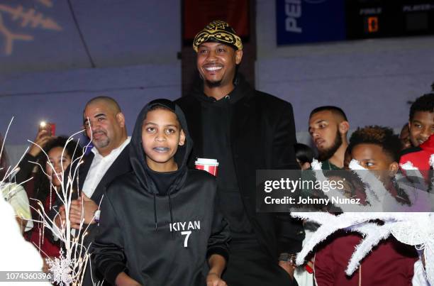 Carmelo Anthony and son Kiyan Carmelo Anthony attend the 3rd Annual Winter Wonderland Holiday Charity Event Hosted By La La Anthony at Gauchos Gym on...