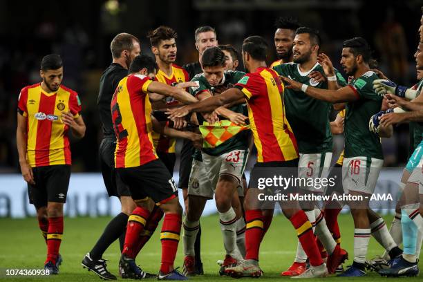 Players of ES Tunis and CD Guadalajara reacts after Anice Badri of Esperance de Tunis receives a red card during the FIFA Club World Cup UAE 2018 5th...