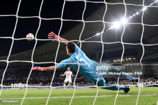 Tsukasa Shiotani of Al Ain scores his team's second penalty in the penalty shoot out past Franco Armani of River Plate during the FIFA Club World Cup...