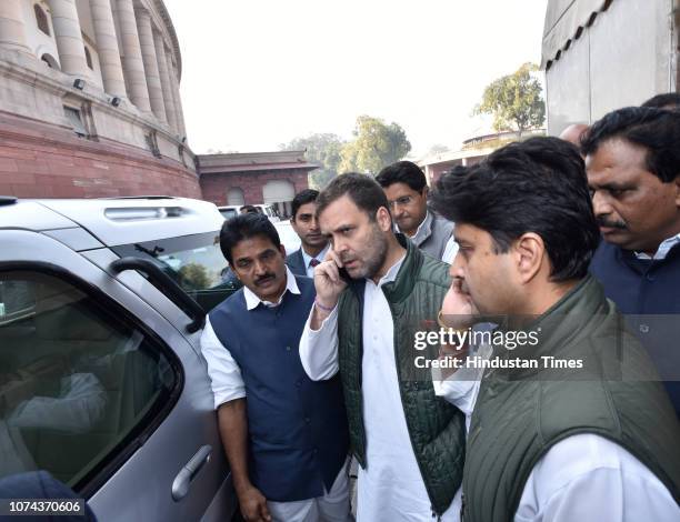 Congress President Rahul Gandhi, party MP Jyotiraditya Scindia and others arrive during the winter session in Parliament, on December 18, 2018 in New...