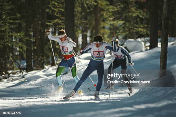 Ladislav Patras of Czechoslovakia and Andreas Schaad of Switzerland skiing in the Men's Nordic Combined 10km cross country event on 24 February 1988...