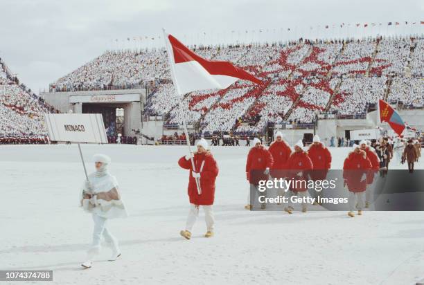 Albert II, Prince of Monaco carries the flag of Monaco during the Opening Ceremony on 13 February 1988 of the XV Olympic Winter Games in the McMahon...