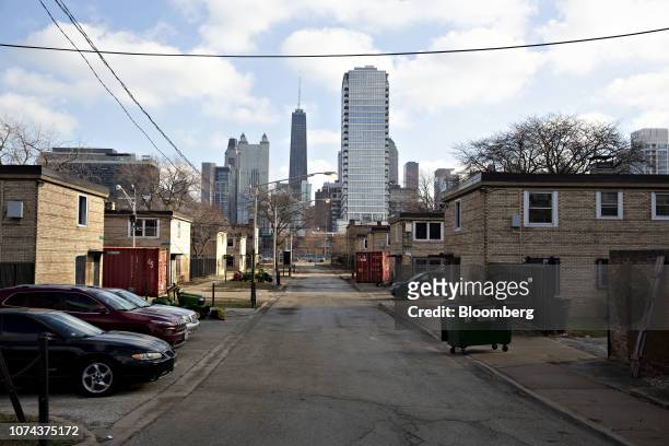 Vehicles sit parked outside of Cabrini-Green rowhouses in Chicago, Illinois, U.S., on Wednesday, Dec. 12, 2018. Cook County, which includes the...