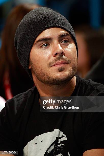 Zac Efron watches the New Orleans Hornets take on the Detroit Pistons at the New Orleans Arena on December 8, 2010 in New Orleans, Louisiana. NOTE TO...
