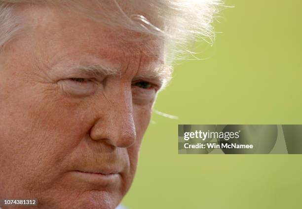 President Donald Trump answers questions from the press while departing the White House November 29, 2018 in Washington, DC. Trump answered numerous...