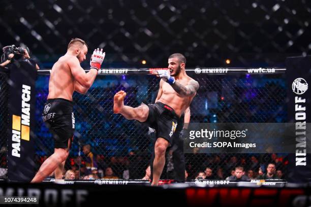 Sabil Rabil from Ukraine and Lazarevich Eduard from Belarus seen fighting together during the WWFC 13 in Kiev. Lazarevich Eduard won the match.
