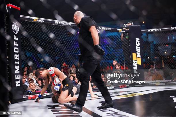 Hara Dimitroula from Greece and Alisa Danyuk from Ukraine seen fighting together during the WWFC 13 in Kiev. Alisa Danyuk won the match.