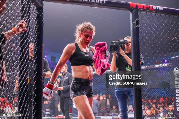 Dimitroula Hara, competitor from Greece is getting out of cage after a hard fighting against Alisa Danyuk from Ukraine during the WWFC 13 in Kiev....