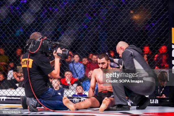 Ukrainian competitor Ali Huseynov seen resting at the middle of the match against Alexandru Ynsuratsel from Moldova during the WWFC 13 in Kiev. Ali...