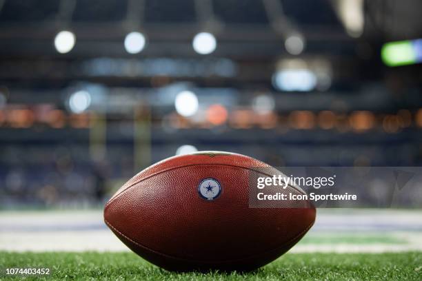 Football with the Dallas Cowboys logo on the field before the NFL game between the Indianapolis Colts and Dallas Cowboys on December 16 at Lucas Oil...