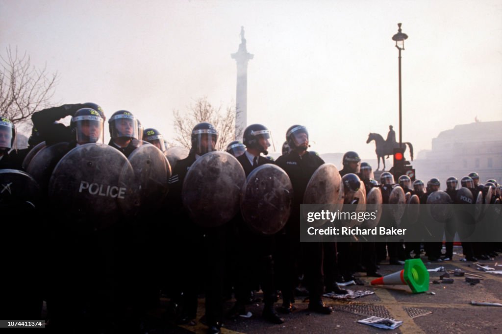 Mancatcher Riot Police Riot police officers stand firm in Trafalgar Square at the height of ...