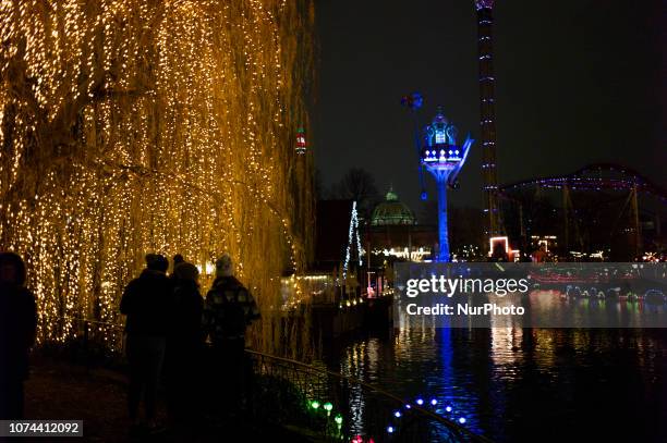 View of Christmas Market in Tivoli Gardens, in Copenhagen, Denmark, on December 14, 2018. Christmas in Tivoli Gardens is tradition amongst...