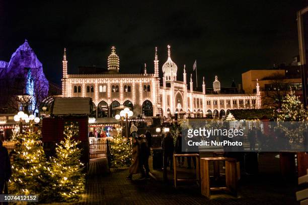 View of Christmas Market in Tivoli Gardens, in Copenhagen, Denmark, on December 14, 2018. Christmas in Tivoli Gardens is tradition amongst...