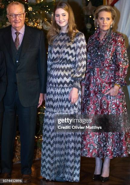 King Albert II of Belgium, Princess Elisabeth and Princess Astrid attend the Christmas Concert on December 19, 2018 in the Royal Palace in Brussels,...