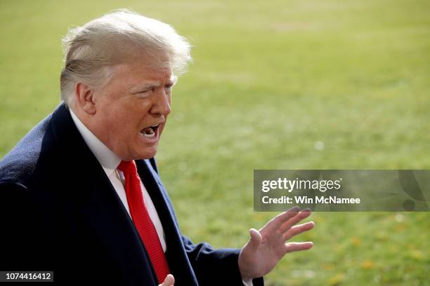 President Donald Trump answers questions from the press while departing the White House November 29, 2018 in Washington, DC. Trump answered numerous...