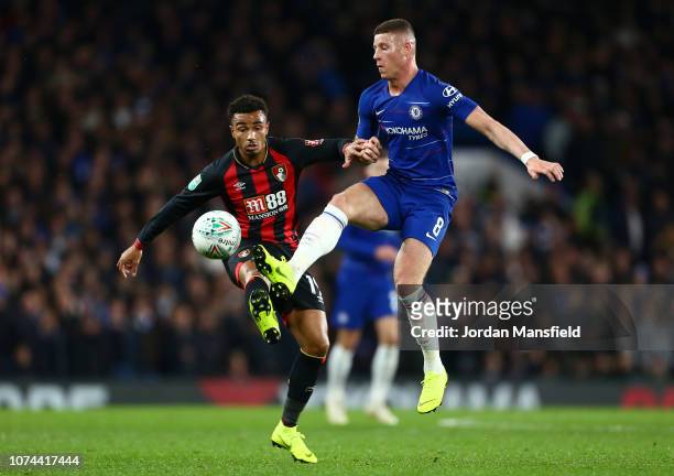 Ross Barkley of Chelsea is challenged by Junior Stanislas of AFC Bournemouth during the Carabao Cup Quarter Final match between Chelsea and AFC...