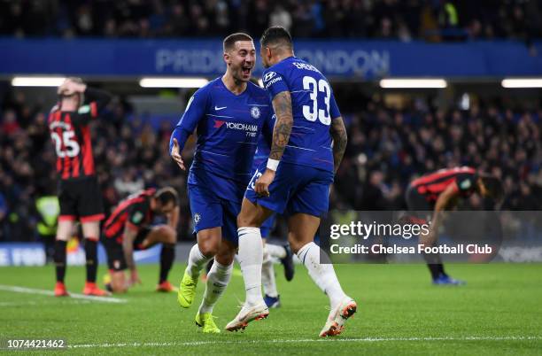Eden Hazard of Chelsea celebrates with teammate Emerson after scoring his team's first goal during the Carabao Cup Quarter Final match between...