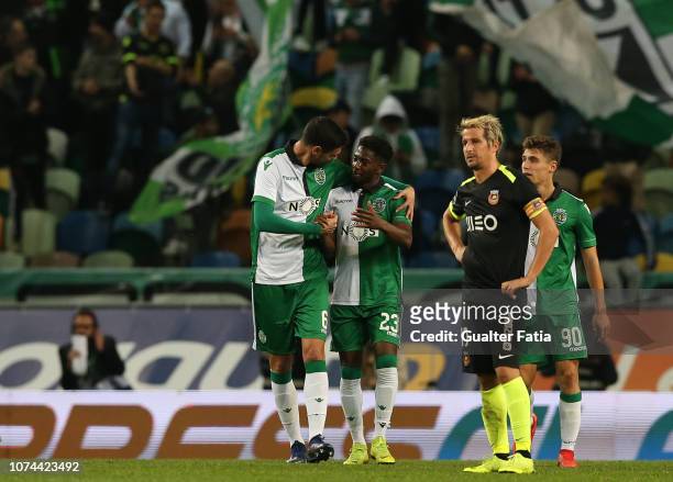 Abdoulay Diaby of Sporting CP celebrates with teammate Andre Pinto of Sporting CP after scoring a goal during the Portuguese Cup match between...