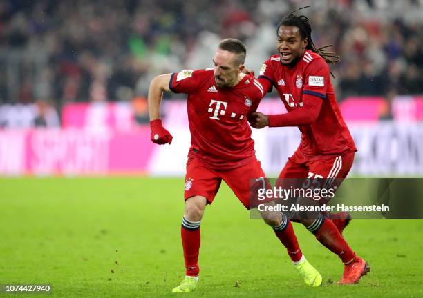 Franck Ribery of Bayern Muenchen celebrates scoring the opening goal with his team mate Renato Sanches during the Bundesliga match between FC Bayern...