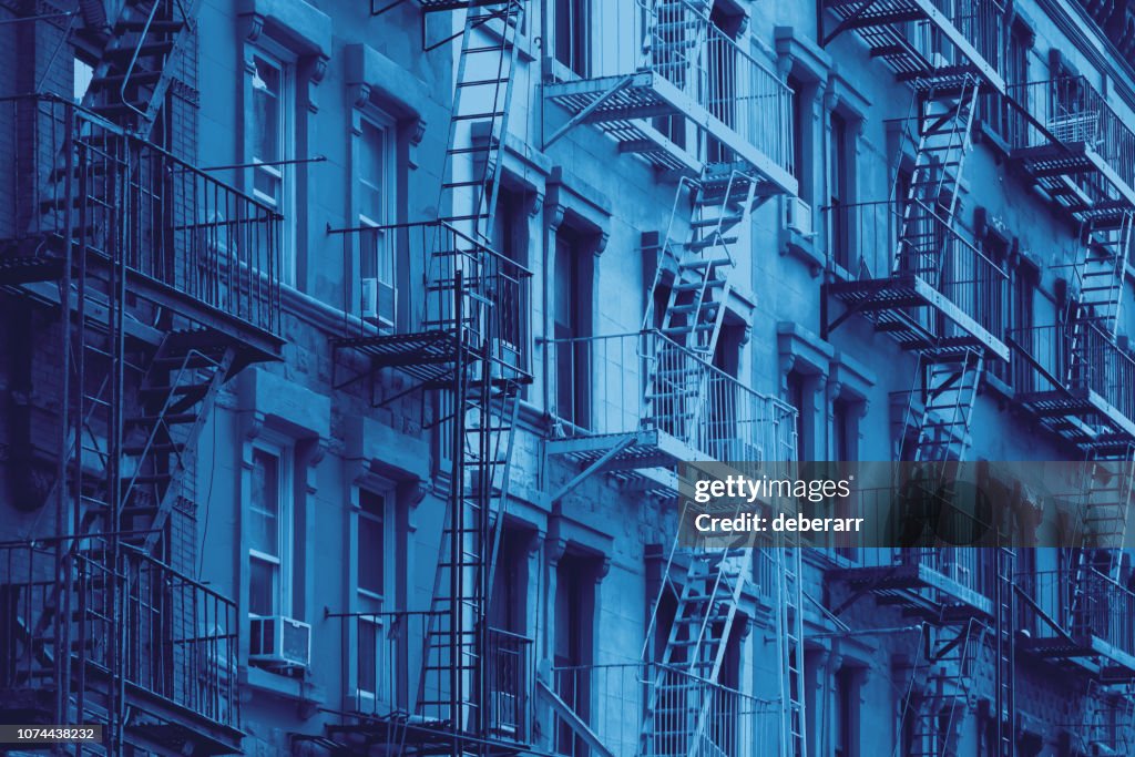 Block of old New York City buildings in blue