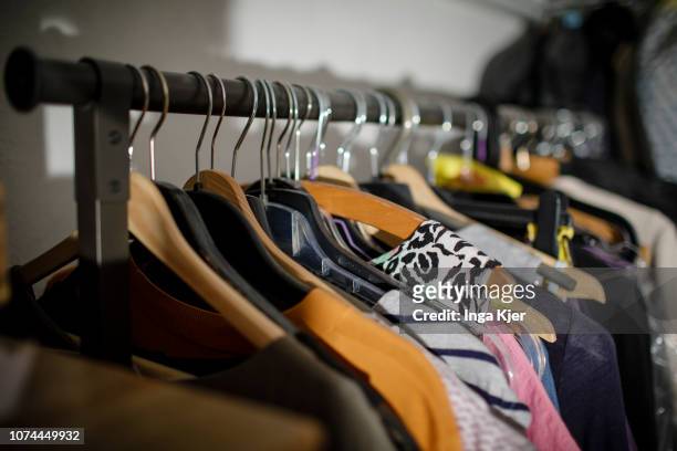 Berlin, Germany Clothes are hanging on hangers on a clothes rail on October 28, 2018 in Berlin, Germany.
