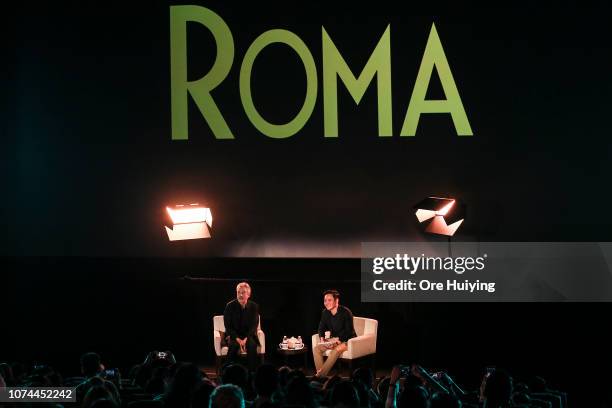 Alfonso Cuaron speaks with Boo Junfeng during the 'ROMA' Screening and Live Streaming Q&A event at Bugis Plus on December 20, 2018 in Singapore.