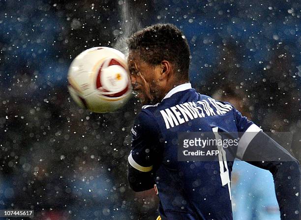 Red Bull Salzburg's Dutch midfielder David Mendes da Silva is hit in the face with the ball during the UEFA Europa League group A football match...