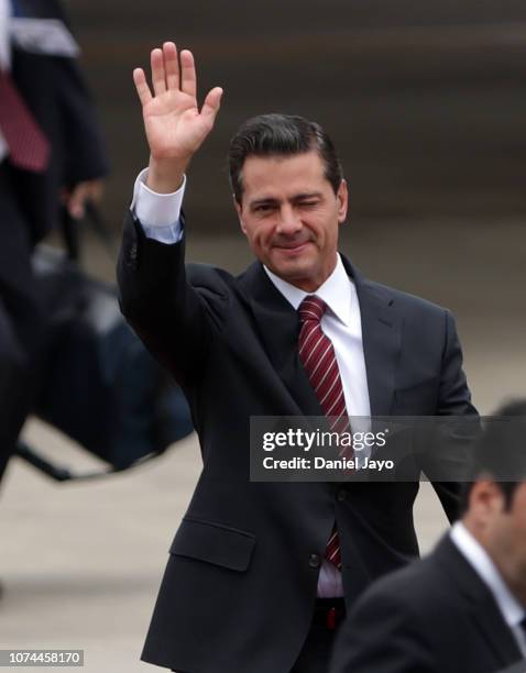 President of Mexico Enrique Peña Nieto waves as he arrives to Buenos Aires for G20 Leaders' Summit 2018 at Ministro Pistarini International Airport...