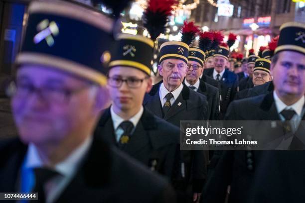 Miners from the Prosper-Haniel coal mine attend the religious service at the Dom cathedral on December 20, 2018 in Essen, Germany. The Prosper-Haniel...