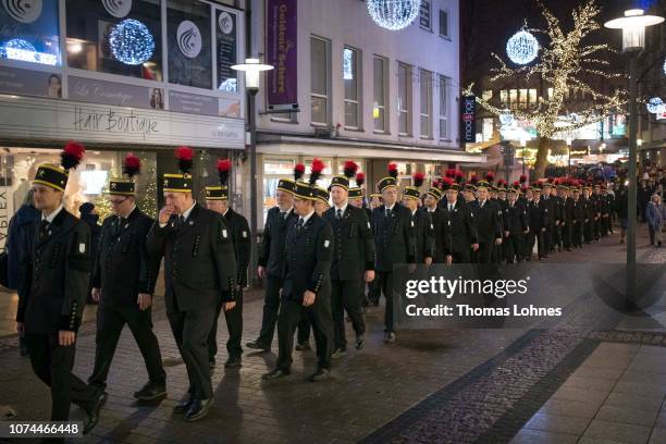 Miners from the Prosper-Haniel coal mine attend the religious service at the Dom cathedral on December 20, 2018 in Essen, Germany. The Prosper-Haniel...