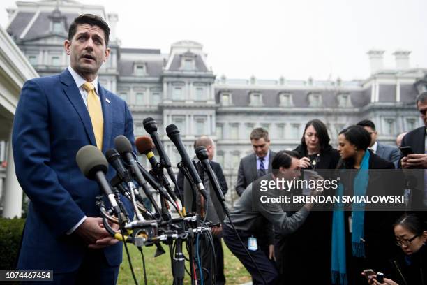 Speaker of the House Paul Ryan makes a statement to the press after a meeting with US President Donald Trump at the White House December 20, 2018 in...