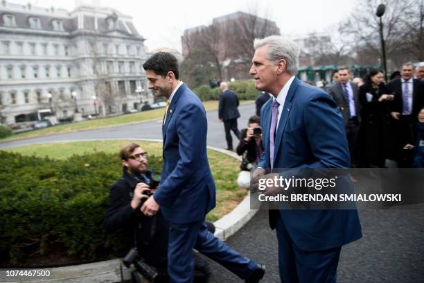 Speaker of the House Paul Ryan and House Majority Leader Representative Kevin McCarthy leave after making a statement to the press following a...