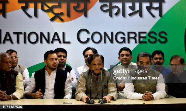 Congress leader Ahmed Patel speaks to media as RJD leader Tejashwi Yadav, Hindustani Awam Morcha founder Jitan Ram Manjhi, Rashtriya Lok Samta Party...