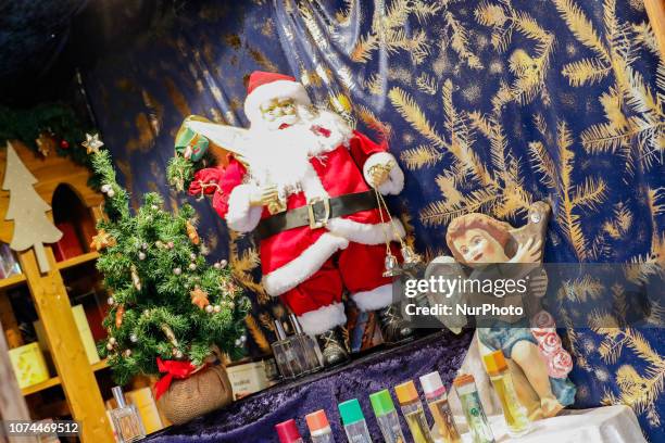 Christmas Tree next to a Santa Claus. Christmas Market in the Northern Bavarian town of Bayreuth