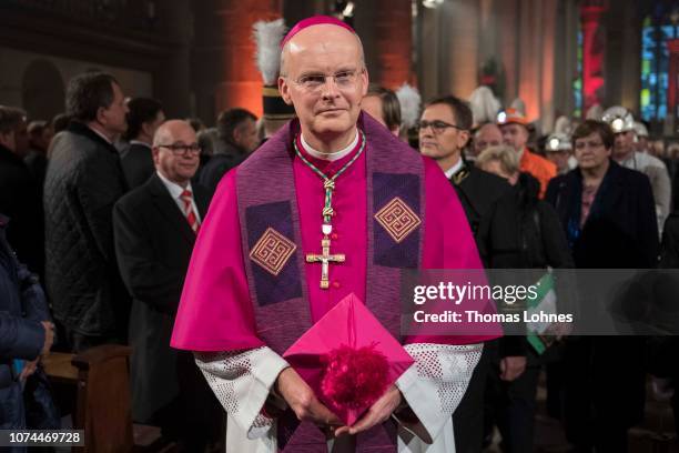 Bishop Franz-Josef Overbeck attend a religious service for miners from the Prosper-Haniel coal mine at the Dom cathedral on December 20, 2018 in...