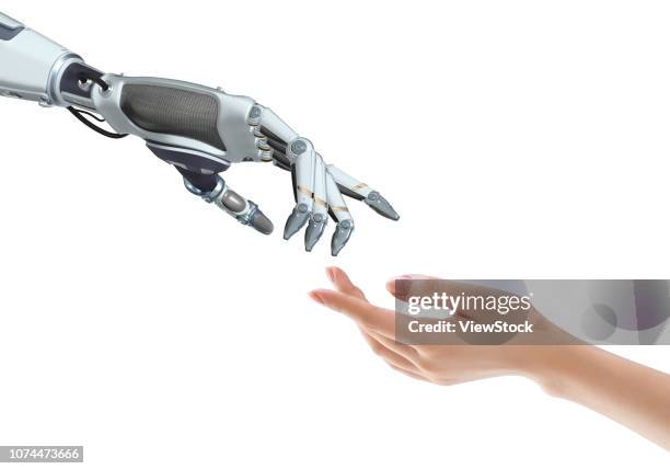 robotic arm and hand - robot and human hand stock pictures, royalty-free photos & images