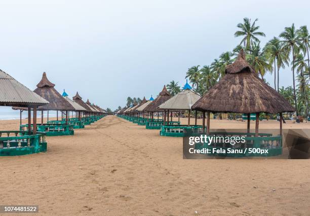 suntan beach - lagos nigeria stock pictures, royalty-free photos & images