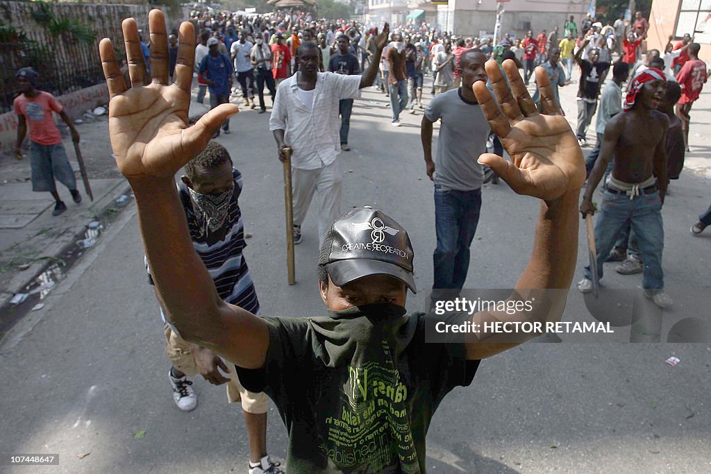 People protest on the streets in Petion-