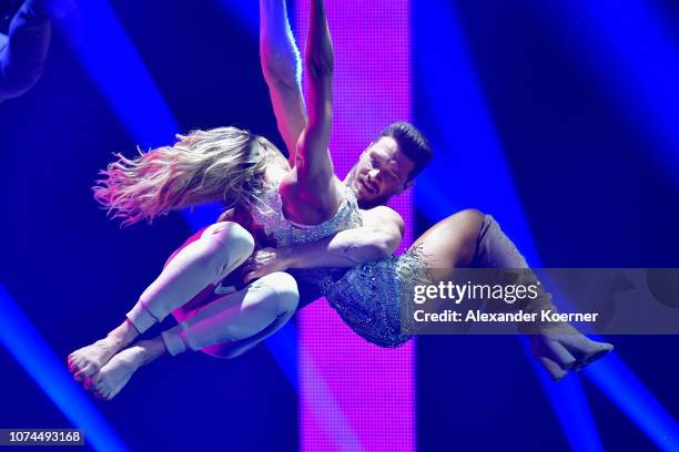 Helene Fischer and Thomas Seitel perform live on stage during the Bambi Awards 2017 show at Stage Theater on November 16, 2017 in Berlin, Germany.